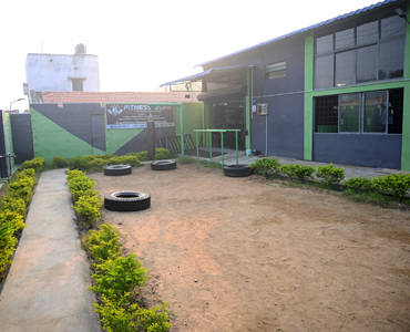 Fitness Zone Fit exterior showcases a modern and inviting gym facility with state-of-the-art equipment.