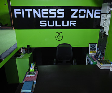 Fitness Zone Fit interior, showcasing modern gym equipment and a welcoming atmosphere.